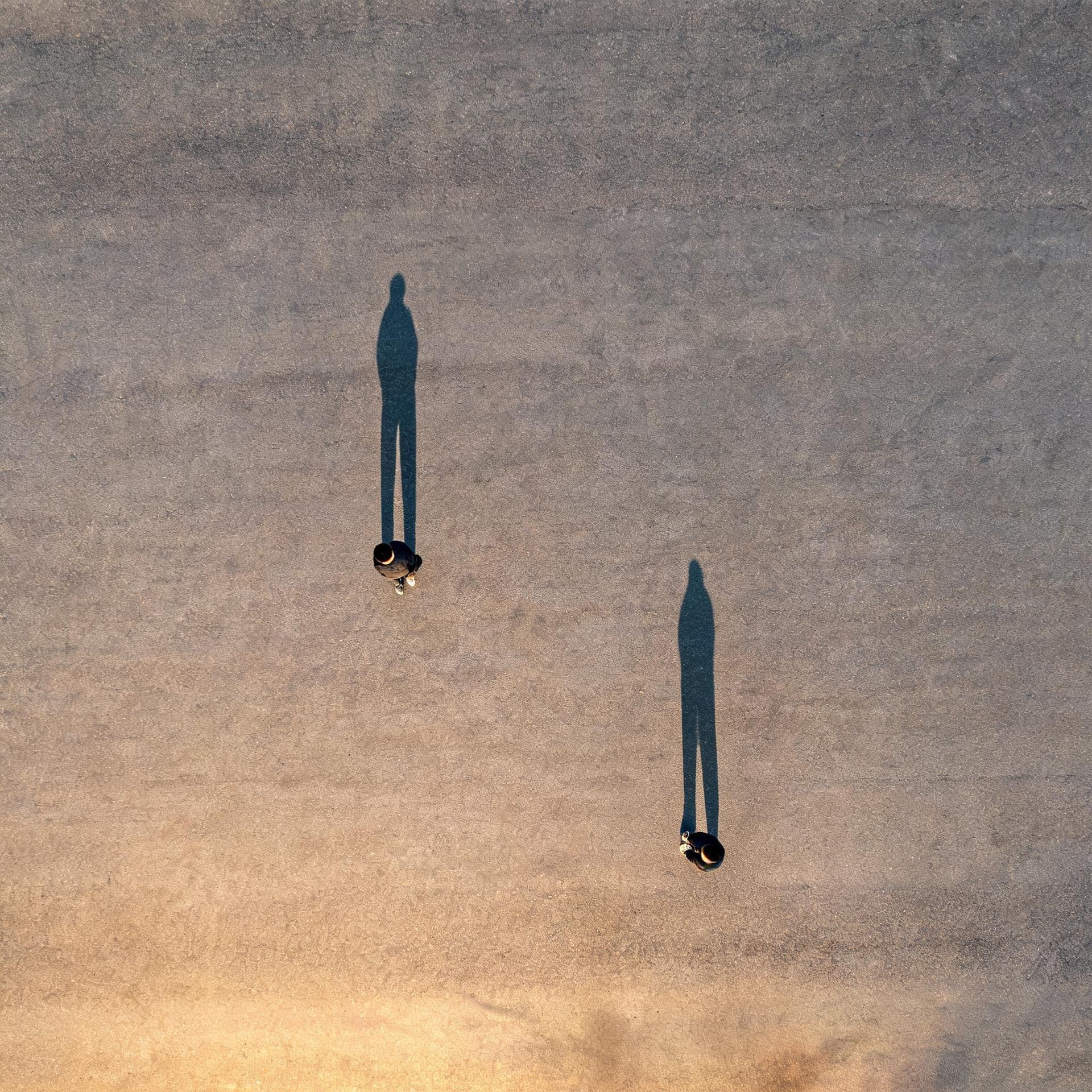 Two People, Long Shadows (Overhead)